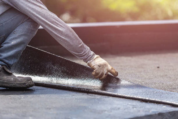 Professional Basement Waterproofing technician working in Richmond, MN